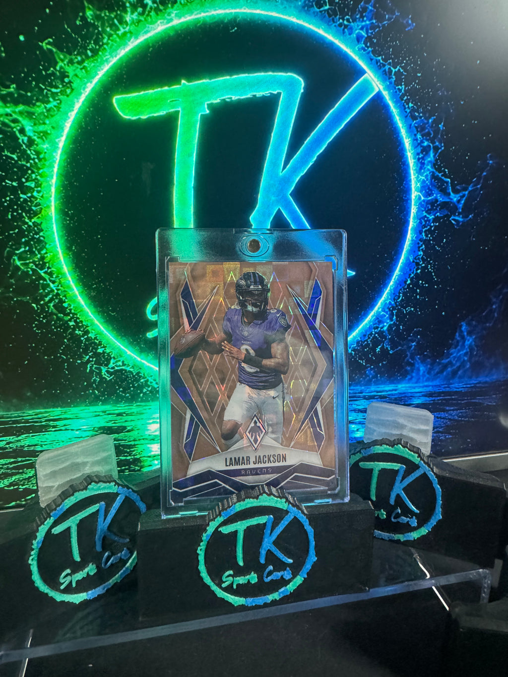 2025 Panini Phoenix Lamar Jackson Copper Pandora /125 #144 – Ravens
