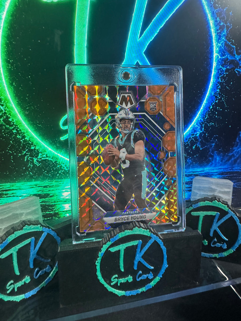 2023 Panini Mosaic Bryce Young RC Orange Fluorescent /199 #290 – Panthers