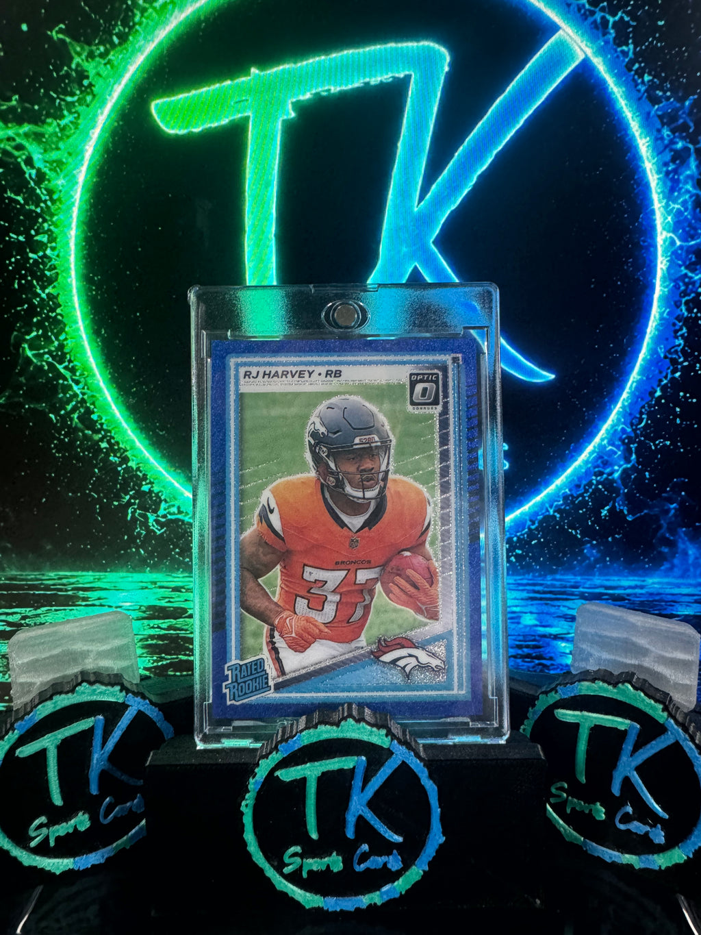 2025 Donruss Optic RJ Harvey Rated Rookie Blue Glitter SP #208 – Broncos